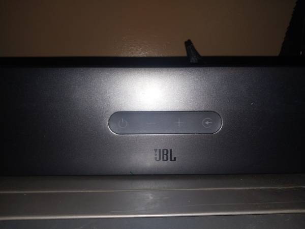 A close up of the bottom of a speaker