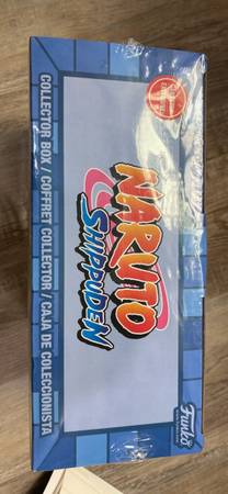 A box of naruto shippuden cards